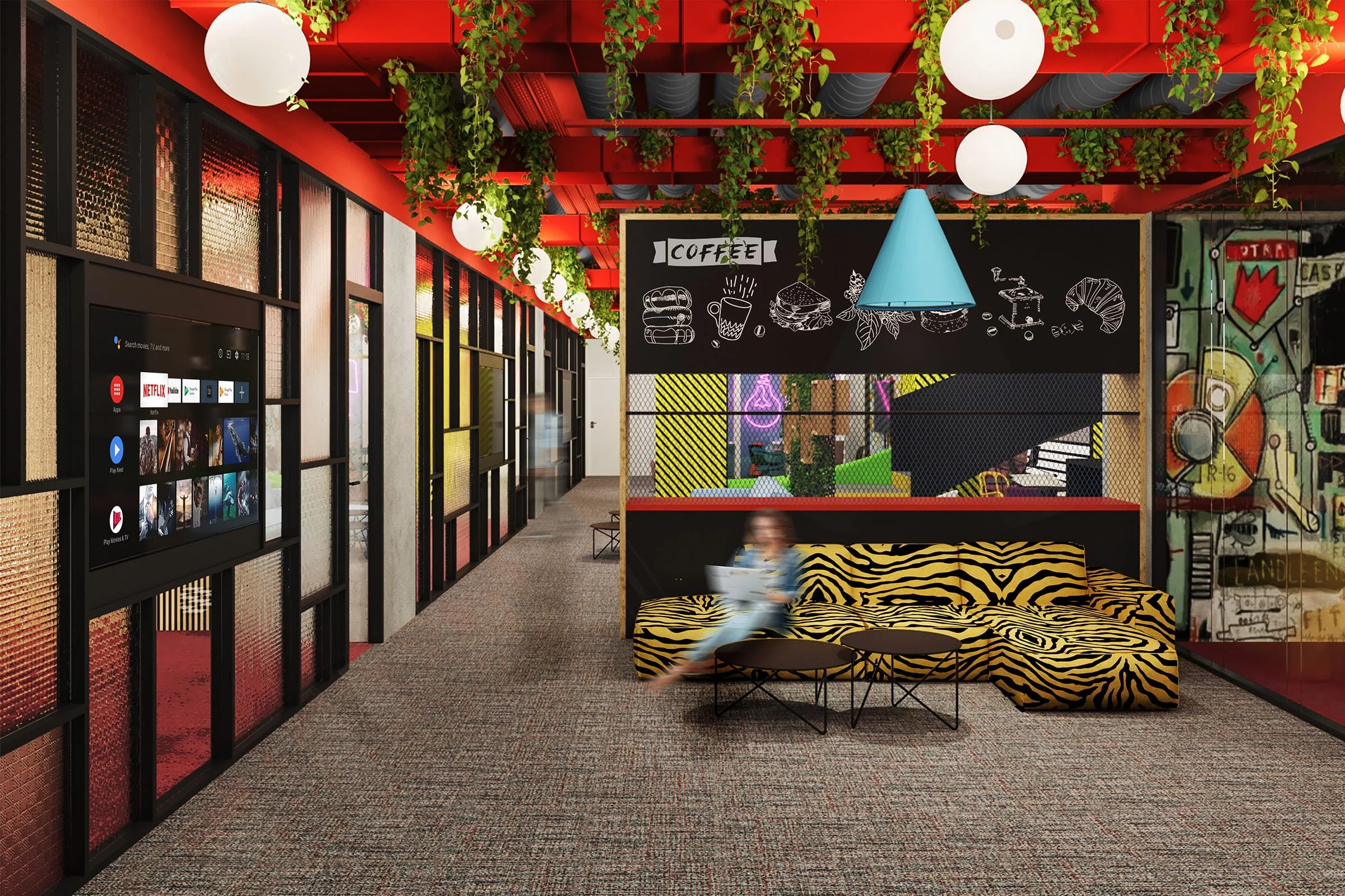 Colorful, modern cafe with vibrant red ceiling, hanging white lamps, and green plants. A blackboard with chalk drawings of food and a blue cone-shaped lamp. Bright yellow and black zebra-patterned sofa with small black tables. A blurred child sitting on the sofa with a toy or cushion, and a wall decorated with colorful graffiti art.