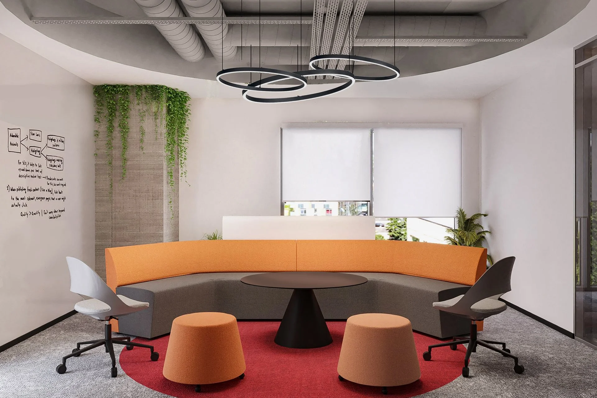 Modern office meeting space with curved orange and gray seating, black round table, two white office chairs, two orange ottomans, large windows with white blinds, green plants, and a whiteboard wall with handwritten notes.