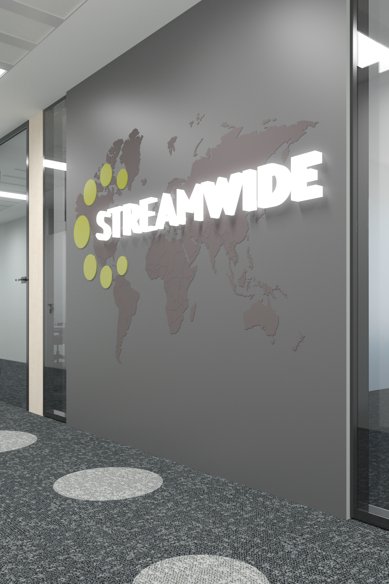 Office wall with the word 'STREAMWIDE' illuminated in front of a world map design with yellow circles.