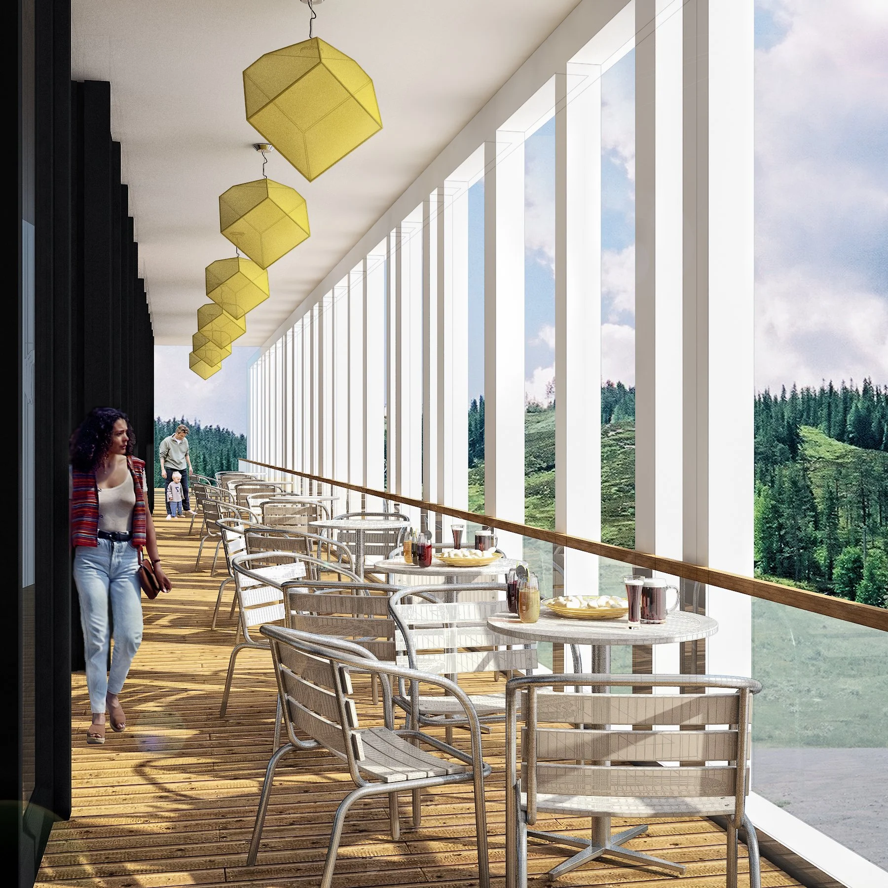 Interior of a bright, modern dining area with a row of round tables set with drinks, located by large floor-to-ceiling windows showing a scenic view of green hills and trees. Yellow geometric pendant lights hang from the ceiling. A woman with curly hair, wearing a striped cardigan and light blue jeans, is walking past the tables.