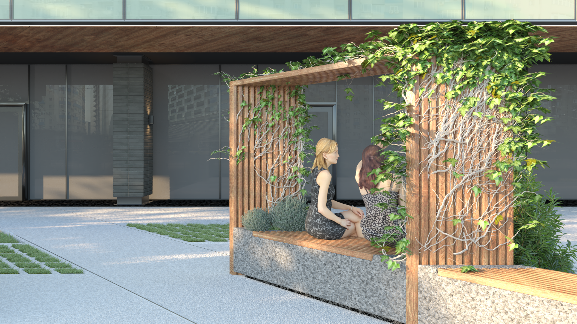 Two women sitting inside a modern outdoor wooden and concrete seating area with green vines, plants, and trees growing along the wooden structure.