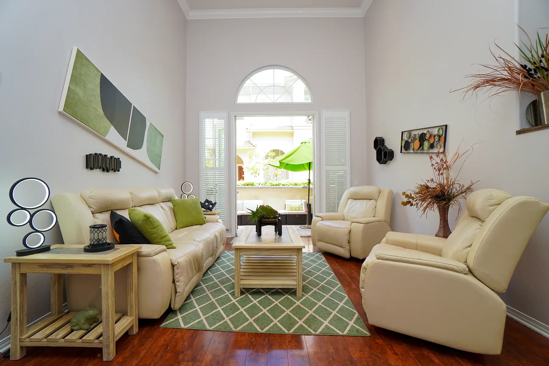 Living room with patio access at 1239 Bayside Lane in Oxnard, CA.