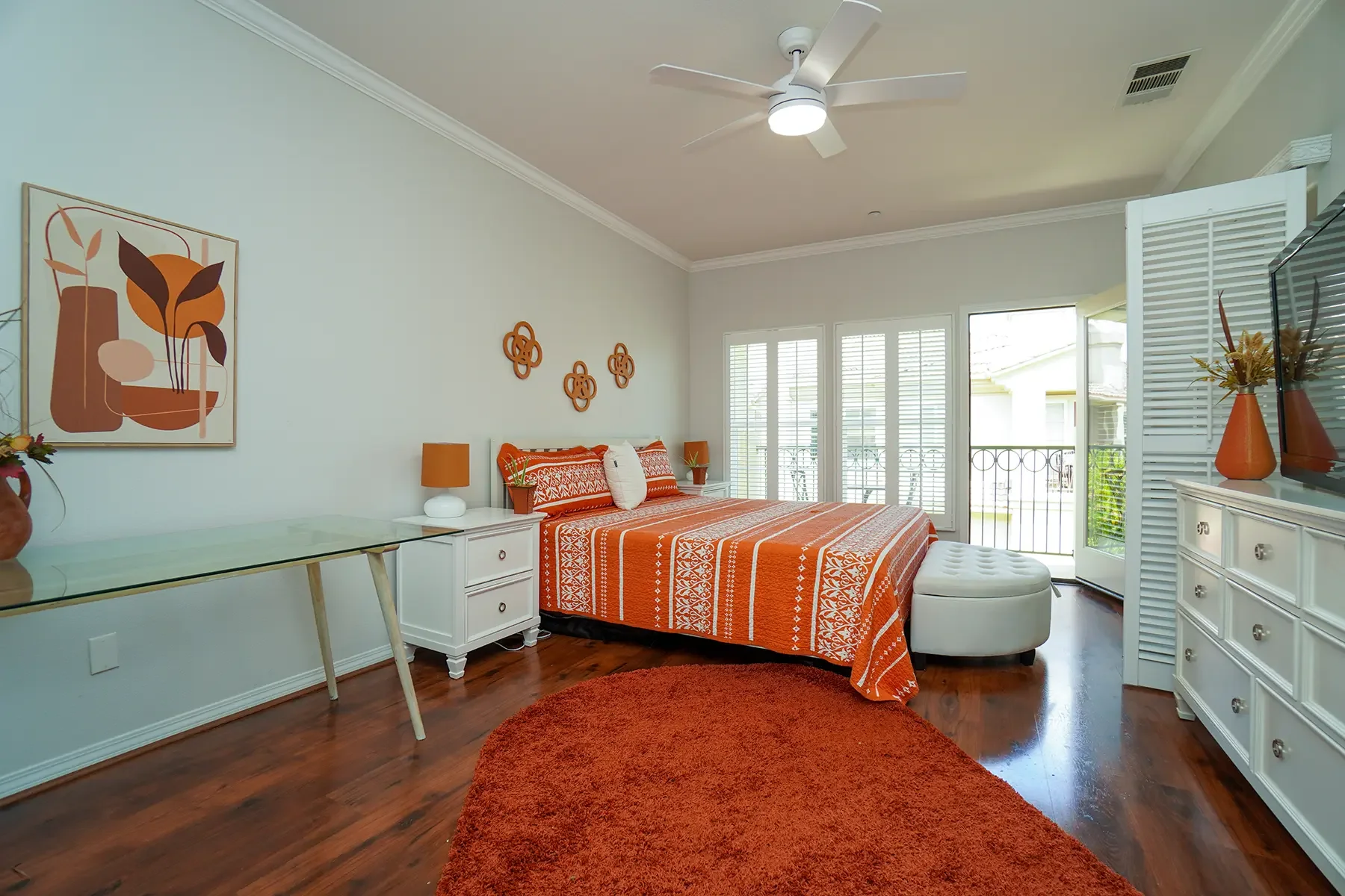 Main bedroom with balcony at 1239 Bayside Lane in Oxnard, CA.