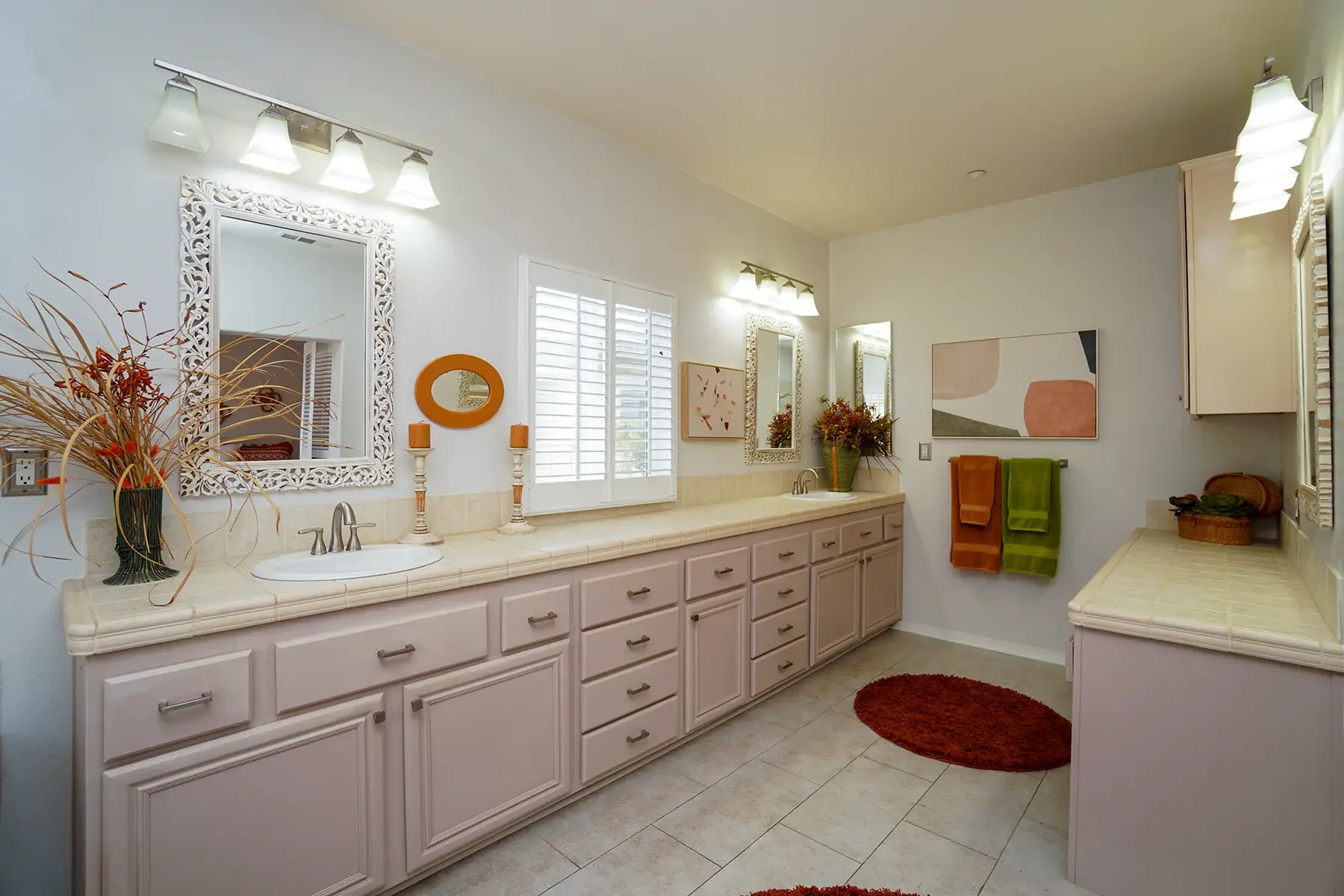 Main bathroom with dual sinks at 1239 Bayside Lane in Oxnard, CA.