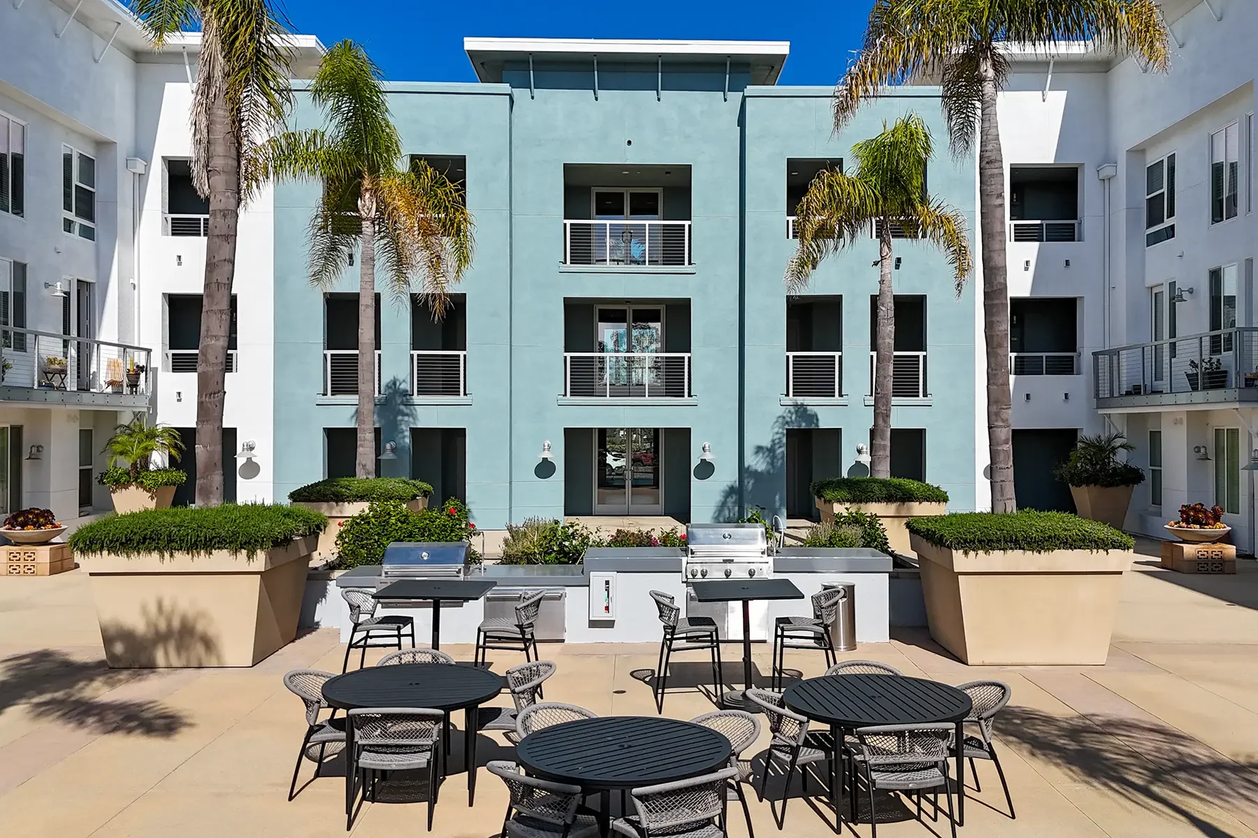 Courtyard and BBQ area photo of 1901 South Victoria Avenue #115 in Oxnard, CA.