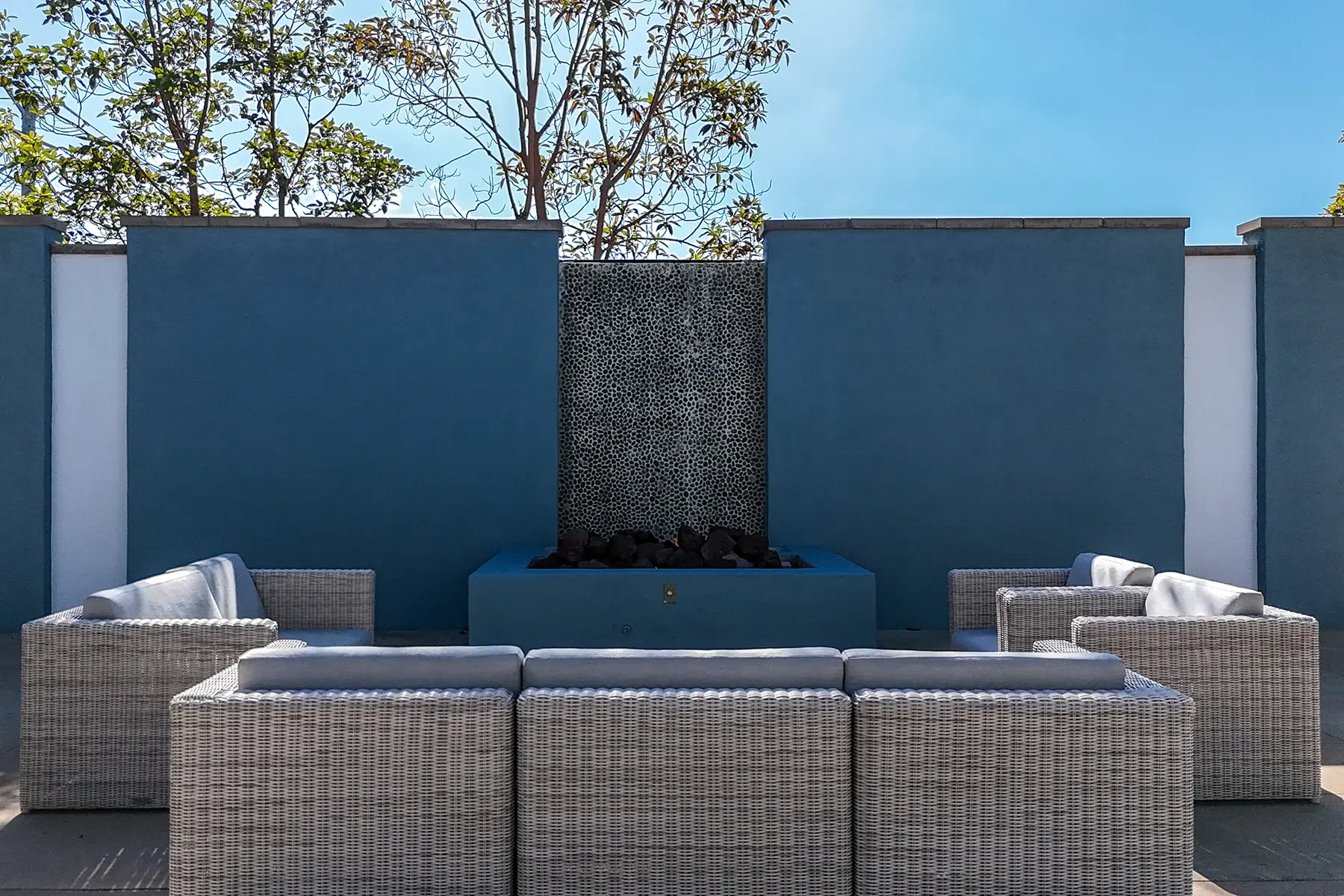 Courtyard waterfall and fire pit photo of 1901 South Victoria Avenue #115 in Oxnard, CA.