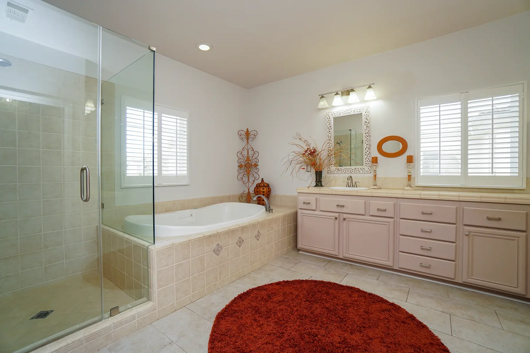 Main bathroom with separate bathtub and shower at 1239 Bayside Lane in Oxnard, CA.