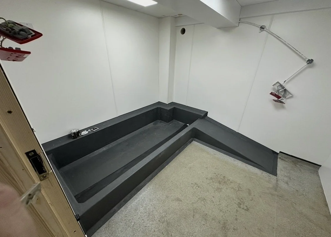 Small quarantine area, hygiene cladded and custom pond framed and fibreglass finish 