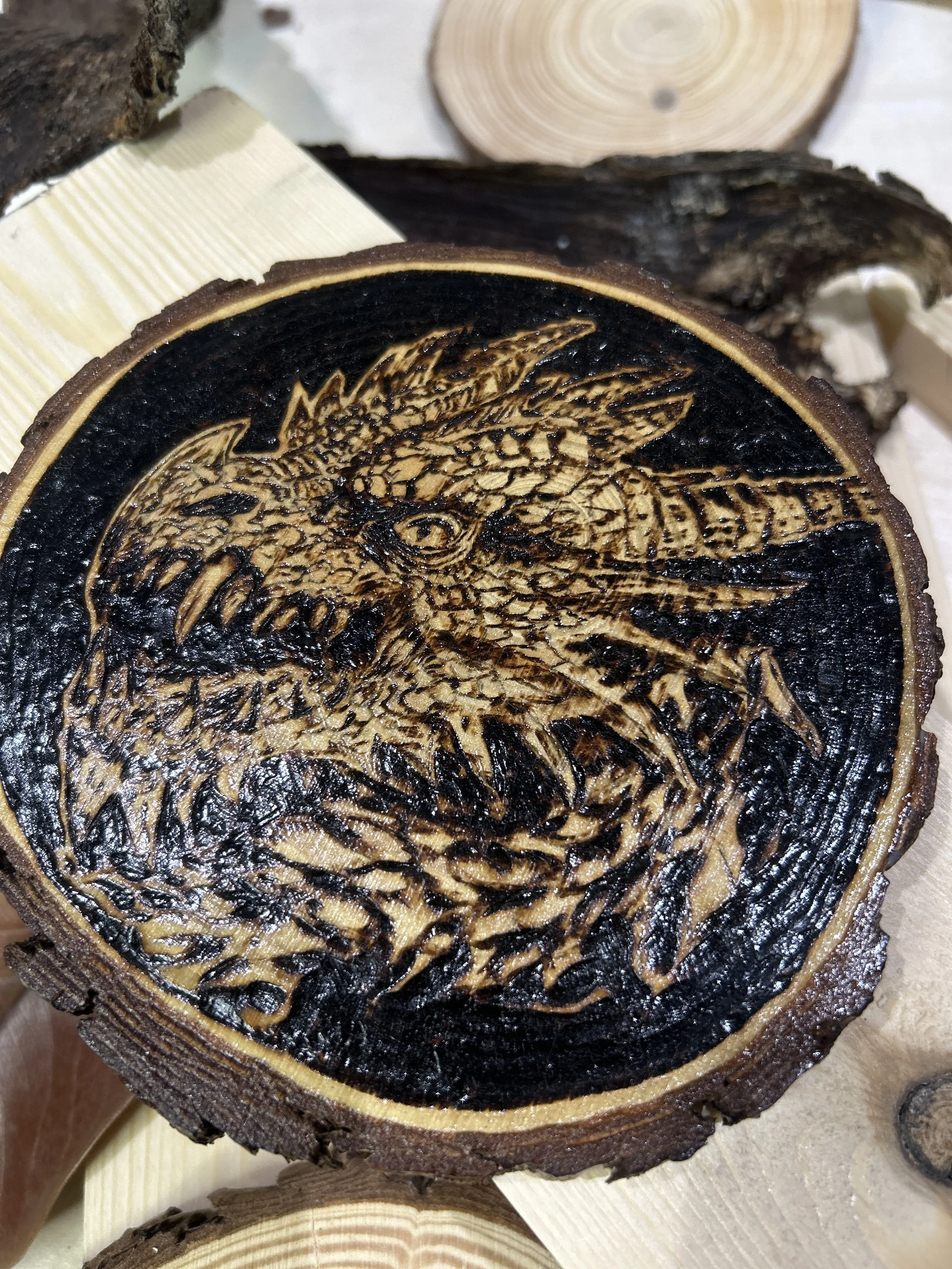 Wood-burned pyrography dragon designs, handcrafted fantasy art in original, unique, artisan, one-of-a-kind decor, detailed wooden creations