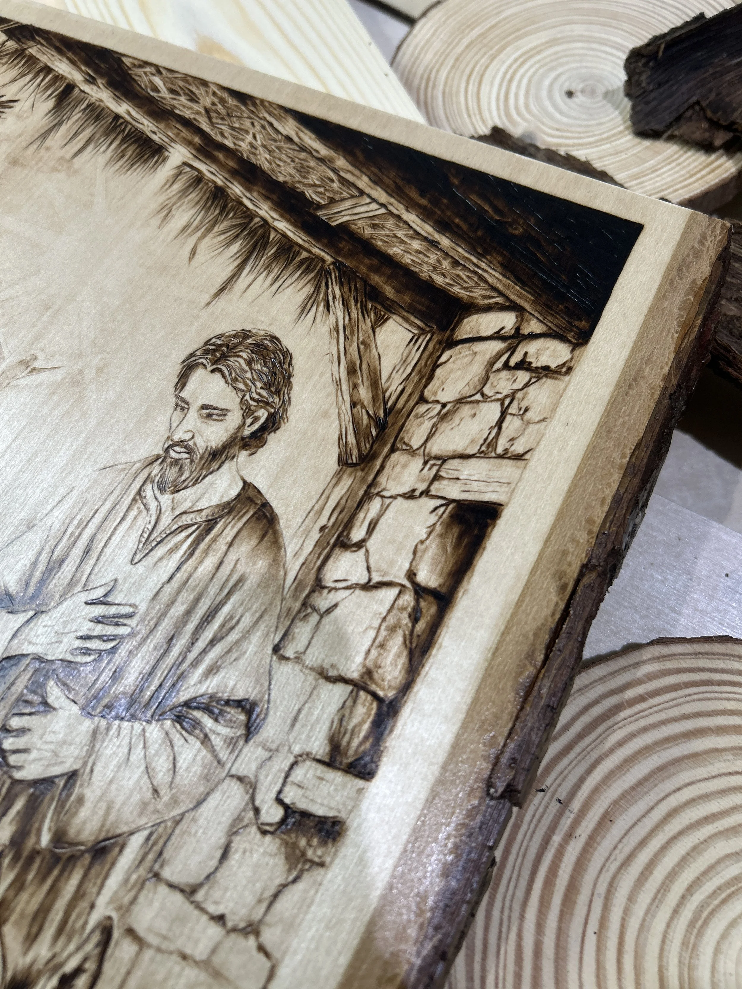 Wood-burned pyrography artworks, handcrafted fantasy art in unique, artisan, one-of-a-kind designs and decor, detailed nativity scenes on natural wood, religious festive Christmas themes