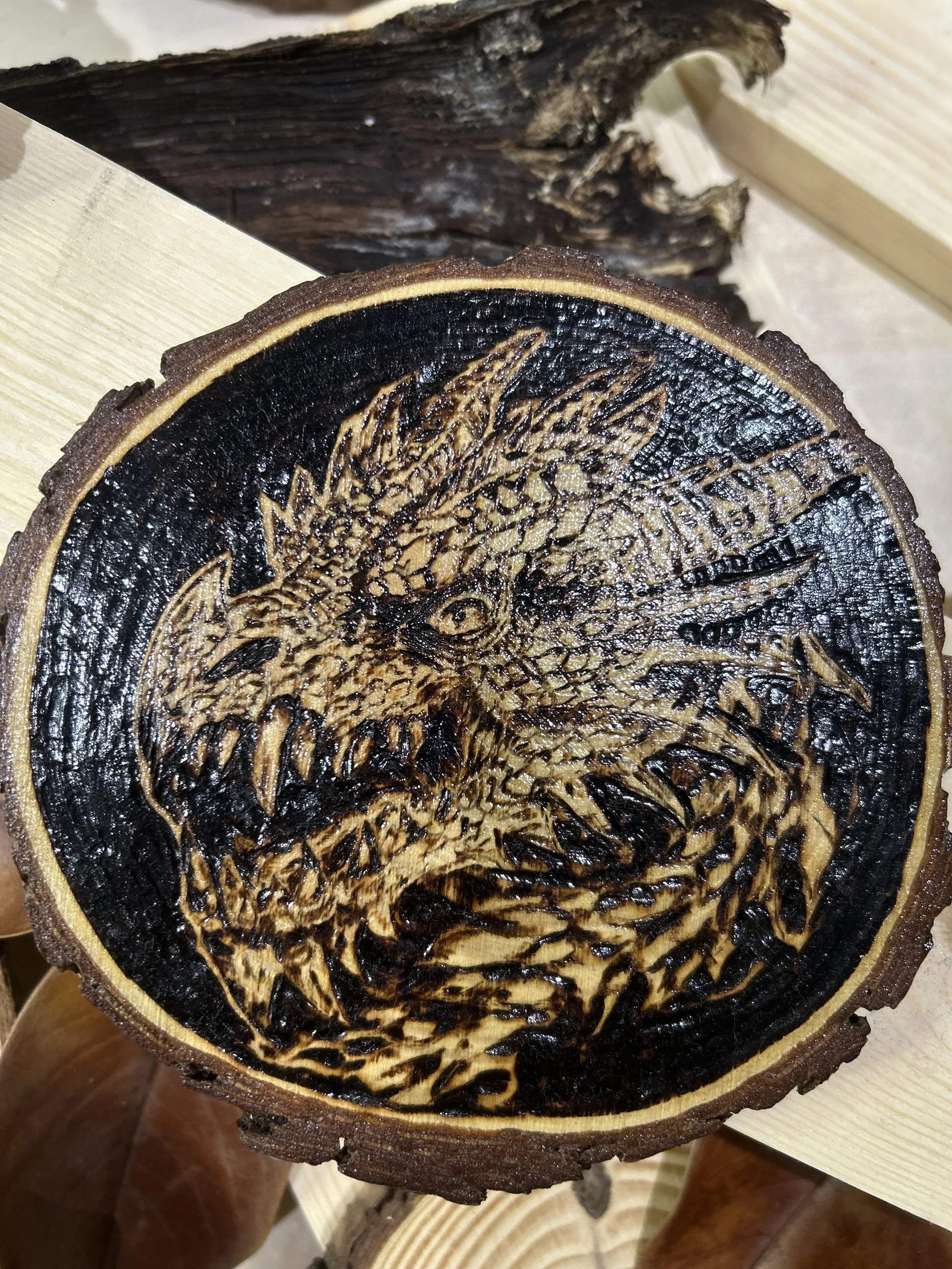 Wood-burned pyrography dragon designs, handcrafted fantasy art in original, unique, artisan, one-of-a-kind decor, detailed wooden creations