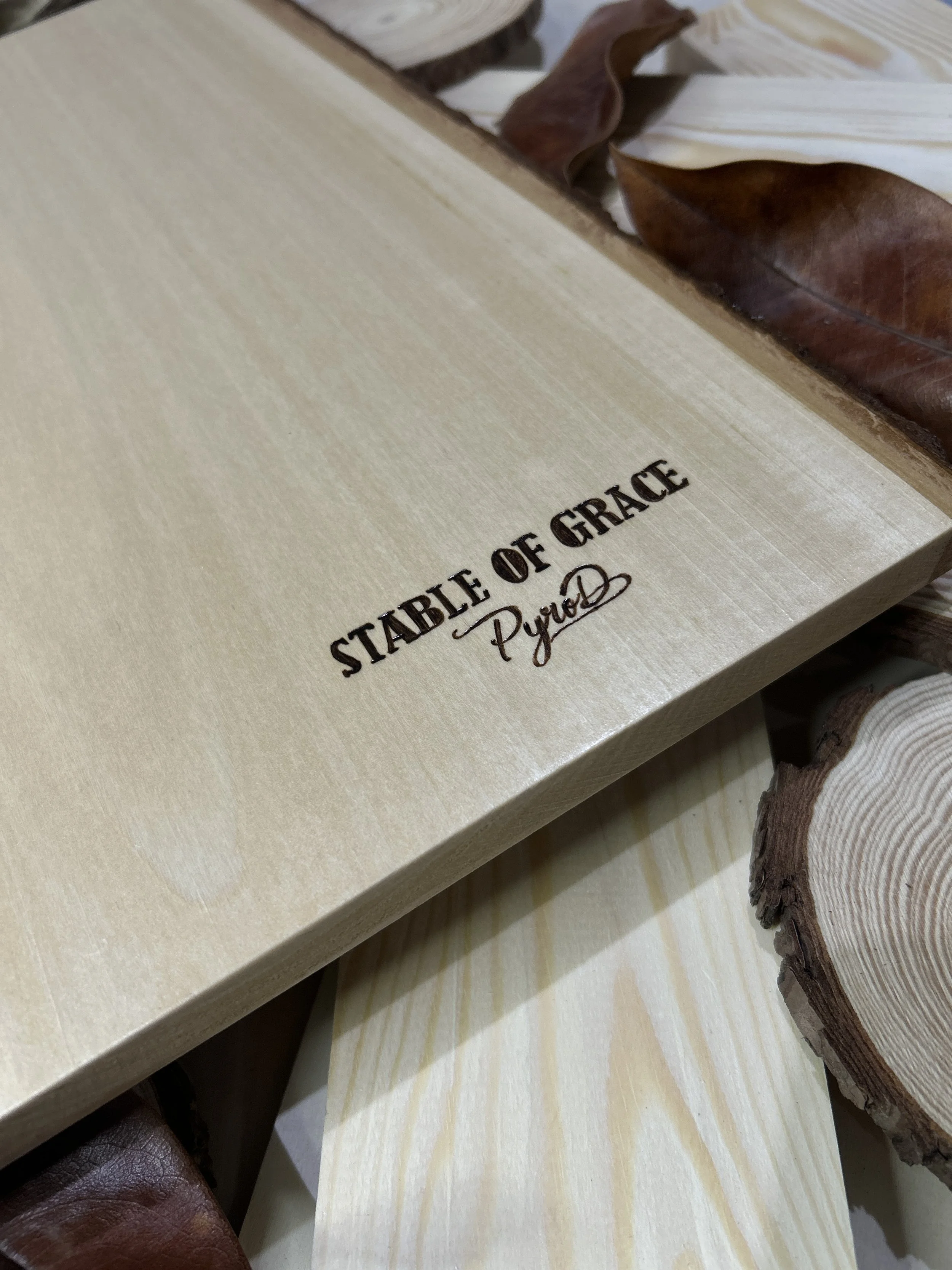 Wood-burned pyrography artworks, handcrafted fantasy art in unique, artisan, one-of-a-kind designs and decor, detailed nativity scenes on natural wood, religious festive Christmas themes