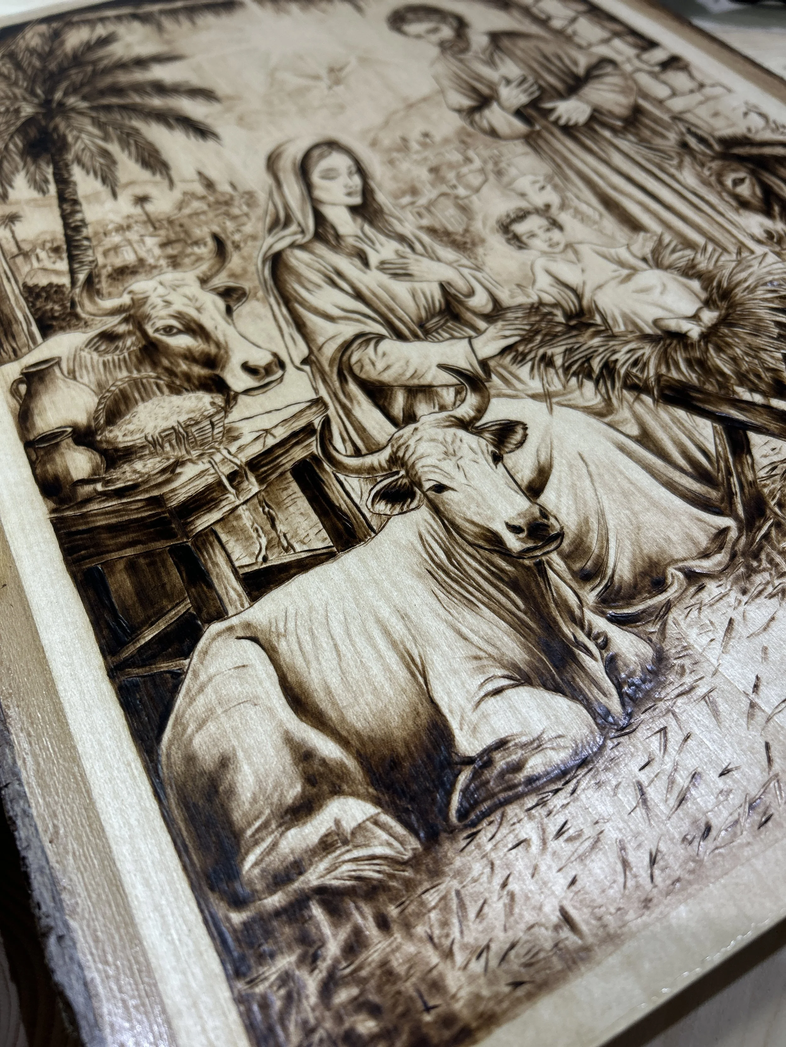 Wood-burned pyrography artworks, handcrafted fantasy art in unique, artisan, one-of-a-kind designs and decor, detailed nativity scenes on natural wood, religious festive Christmas themes
