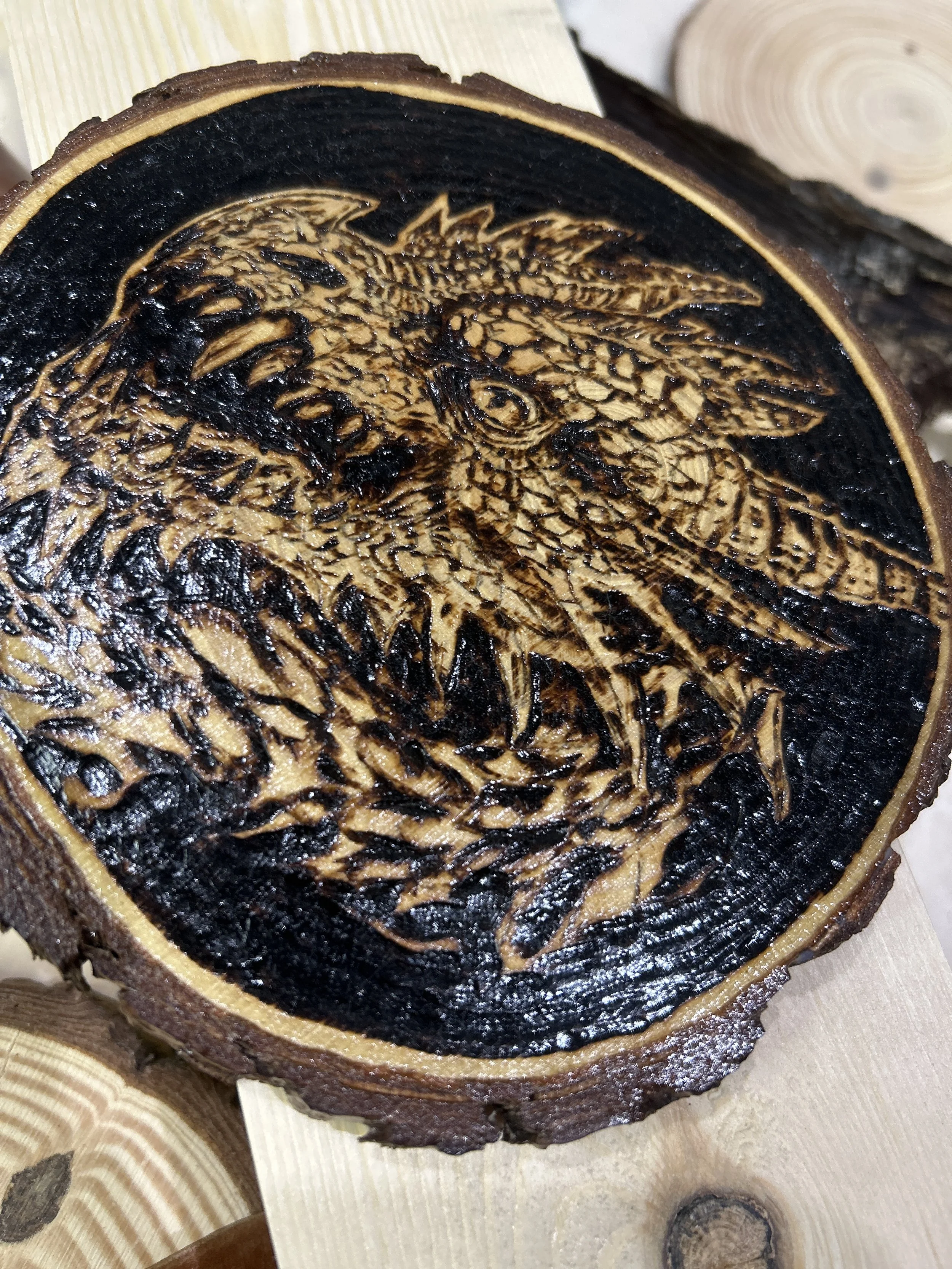 Wood-burned pyrography dragon designs, handcrafted fantasy art in original, unique, artisan, one-of-a-kind decor, detailed wooden creations