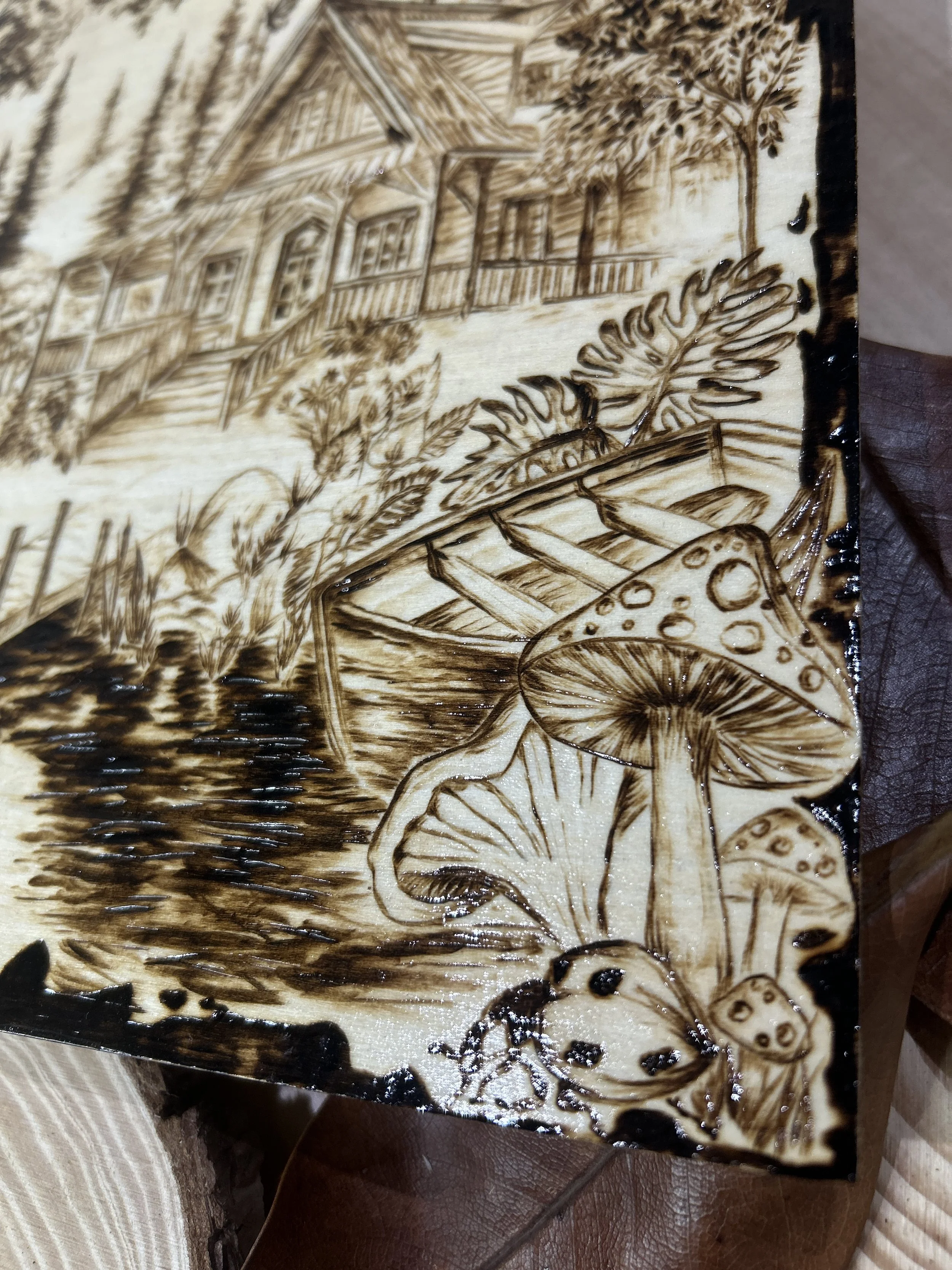 Collection of wood-burned pyrography artworks showcasing handcrafted fantasy art in unique, artisan, one-of-a-kind designs and decor, featuring detailed Dusk Hollow scenes on natural wood