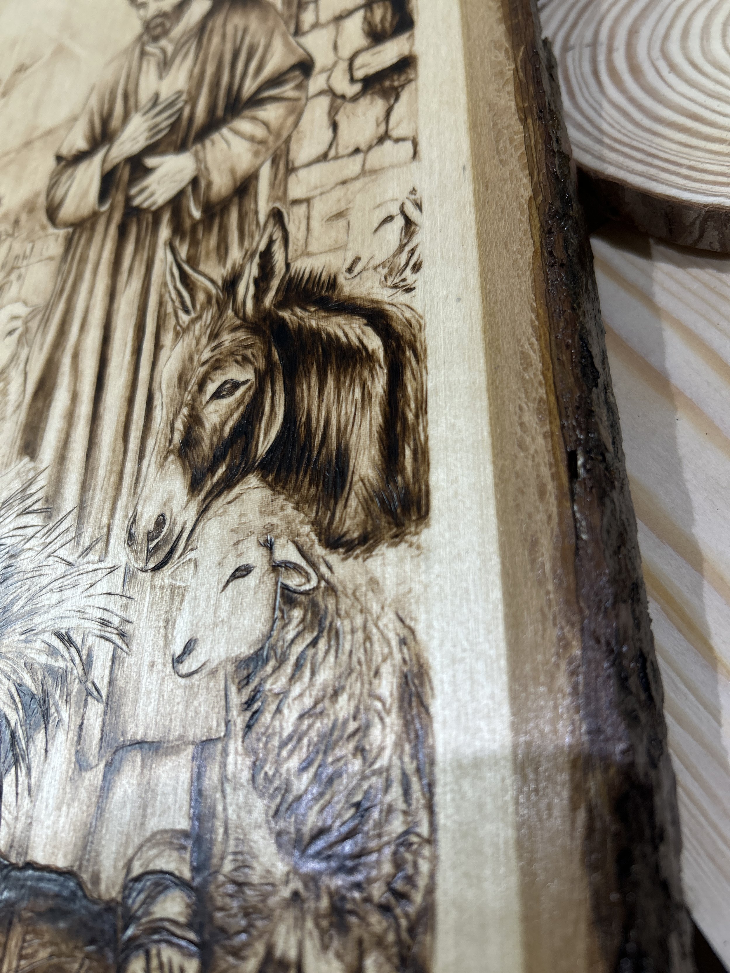 Wood-burned pyrography artworks, handcrafted fantasy art in unique, artisan, one-of-a-kind designs and decor, detailed nativity scenes on natural wood, religious festive Christmas themes