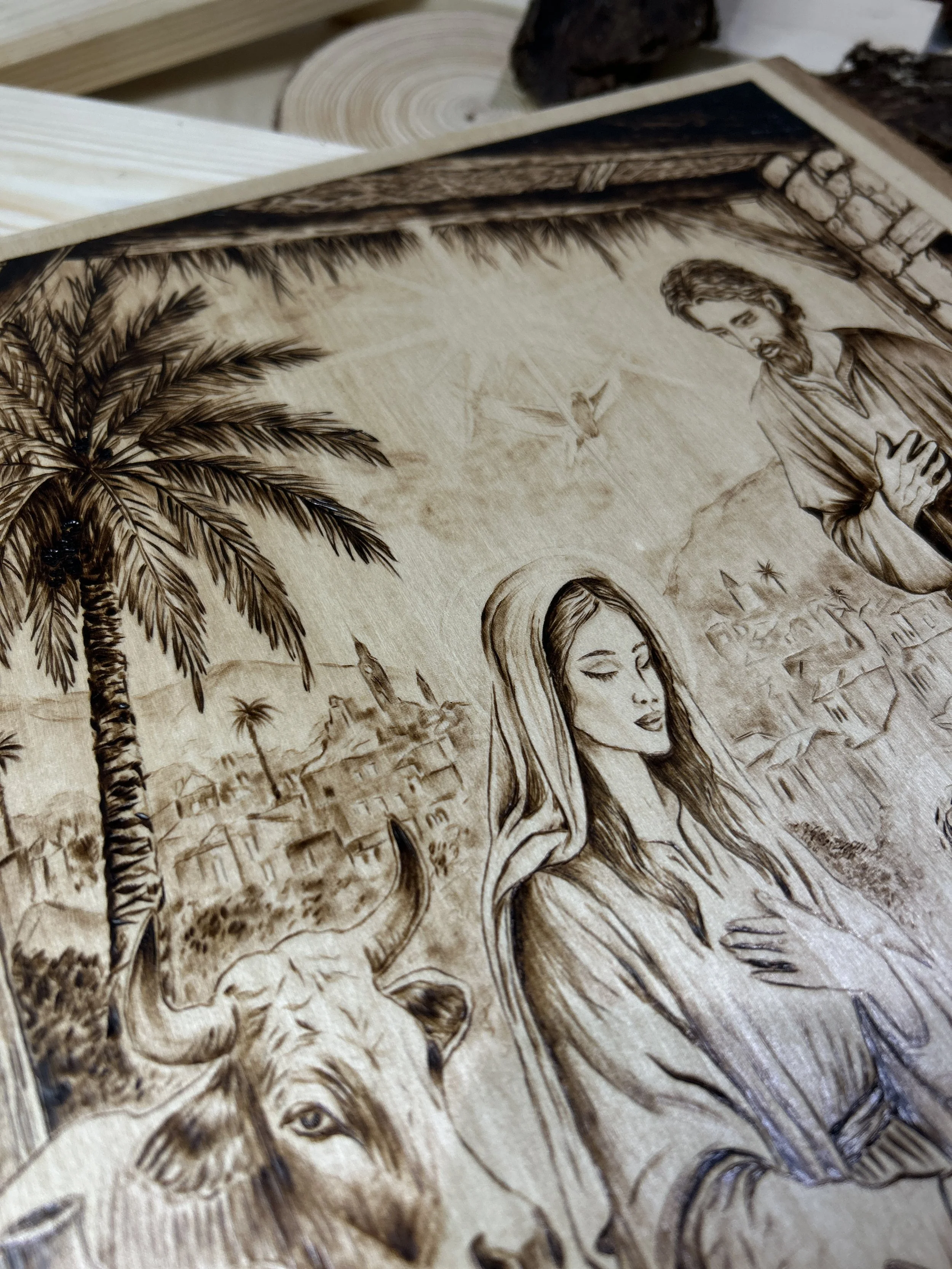 Wood-burned pyrography artworks, handcrafted fantasy art in unique, artisan, one-of-a-kind designs and decor, detailed nativity scenes on natural wood, religious festive Christmas themes