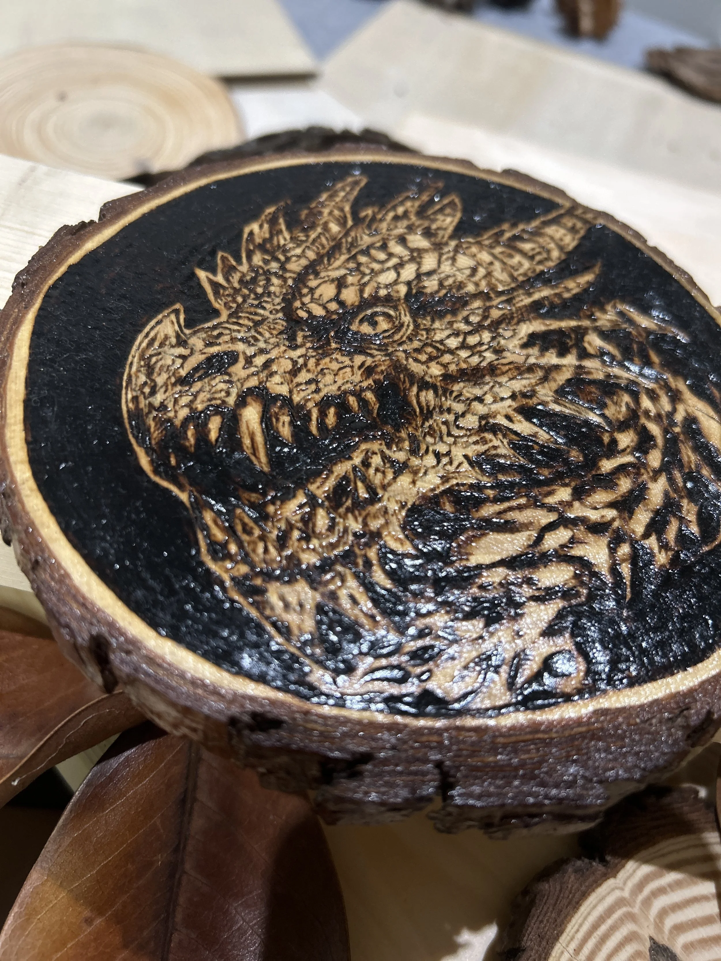 Wood-burned pyrography dragon designs, handcrafted fantasy art in original, unique, artisan, one-of-a-kind decor, detailed wooden creations