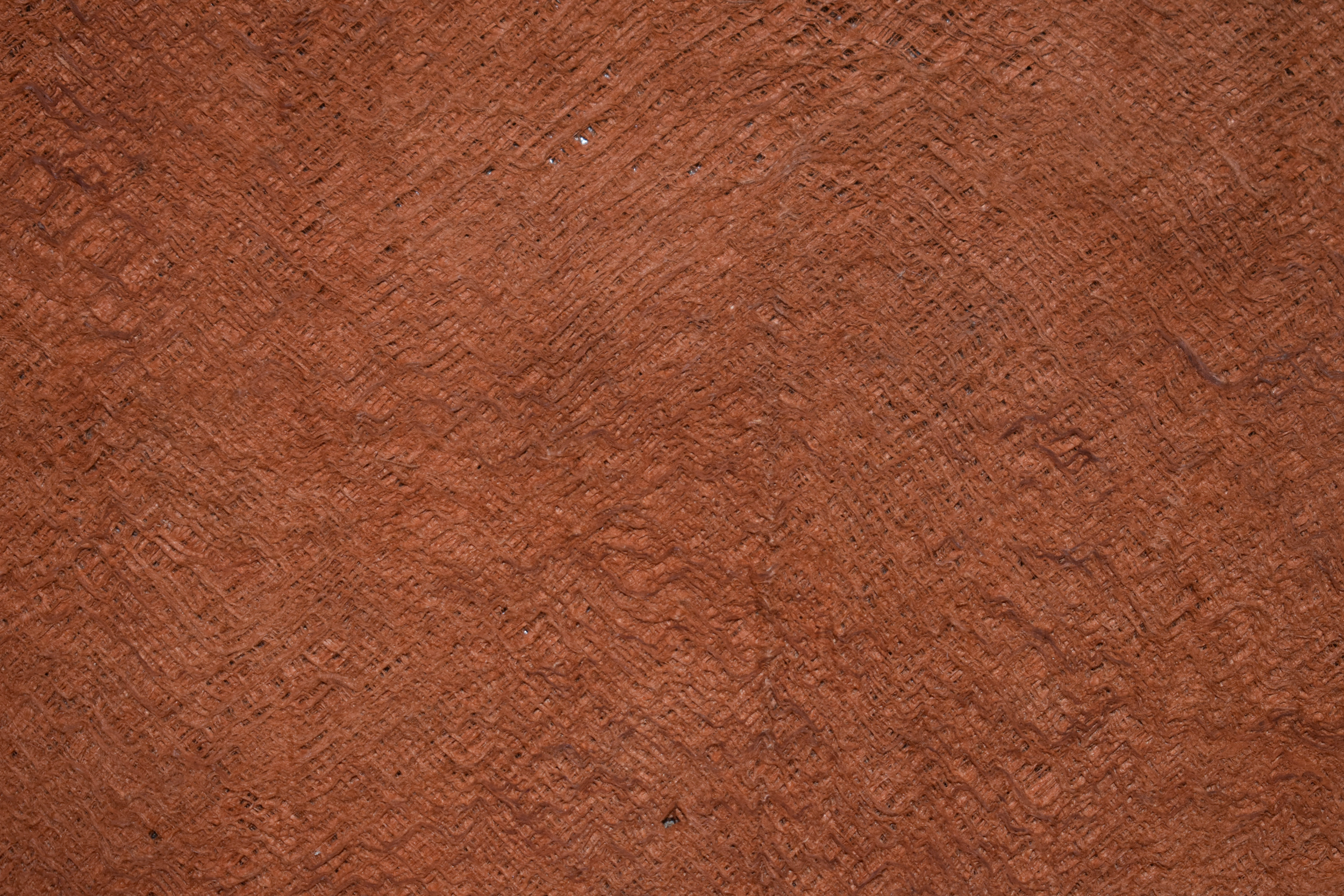 Close up of typical barkcloth texture, resulting from the creation process. Imperfections differ from tree to tree making each piece unique.