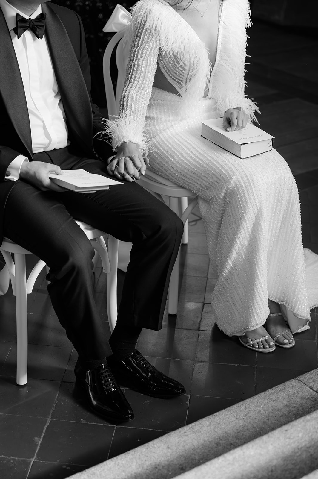 editorial wedding ceremony moment with couple seated together