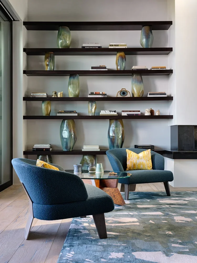 Contemporary Living Room with Custom Shelving by Chandler Prewitt Design