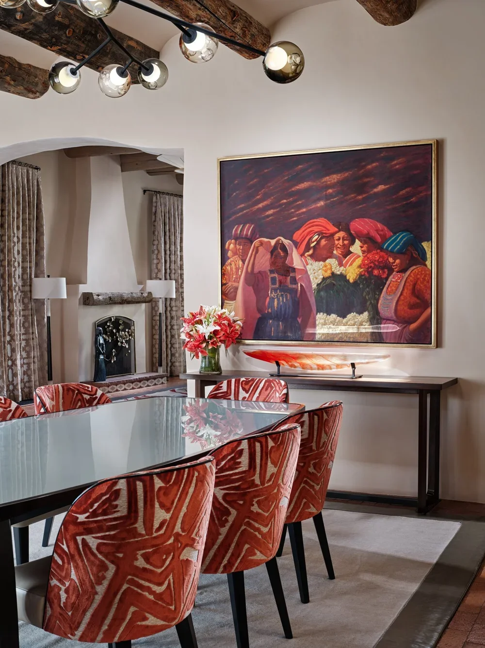 Contemporary Dining Area with Statement Artwork by Chandler Prewitt Design