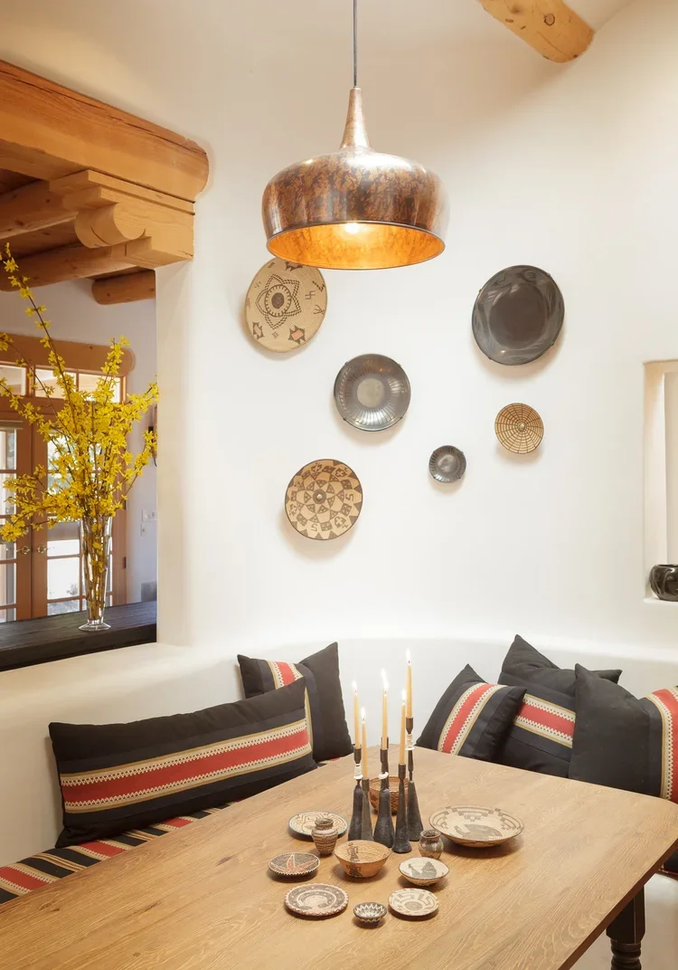 Southwestern Dining Nook with Bench Seating and Woven Wall Baskets