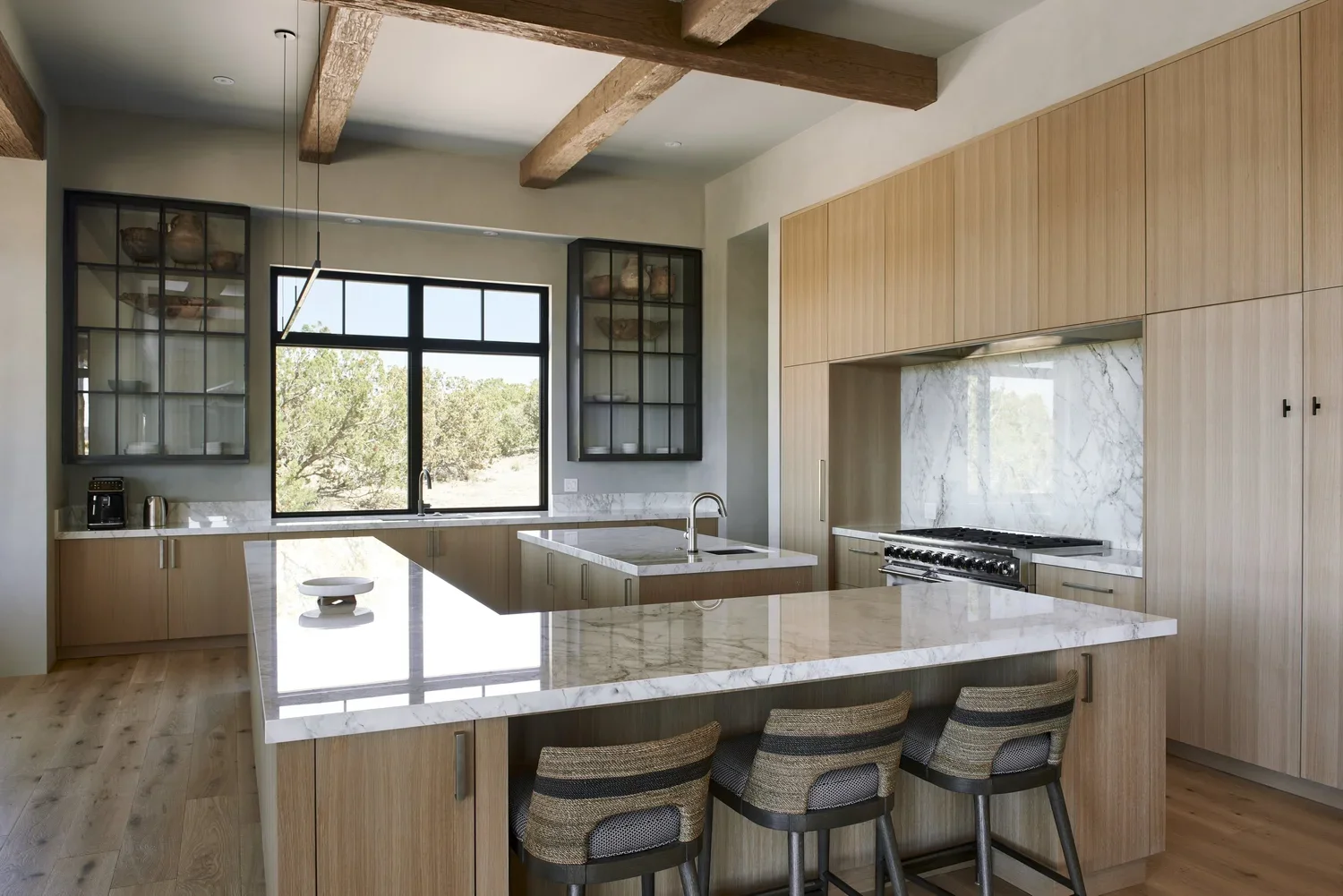 Modern Kitchen with Wood Cabinetry and Island Seating