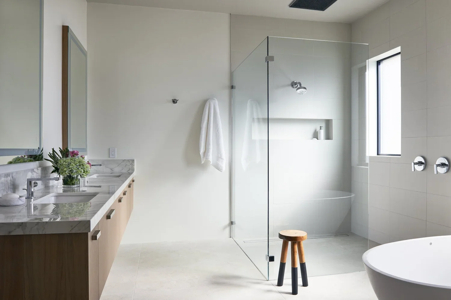 Minimalist Bathroom with Glass Walk-In Shower and Freestanding Tub