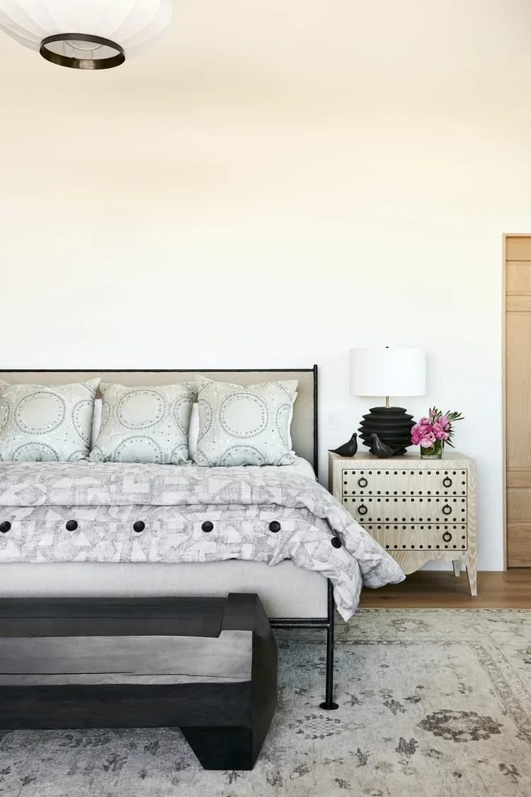 Modern Bedroom with Tufted Upholstered Bed and Neutral Decor
