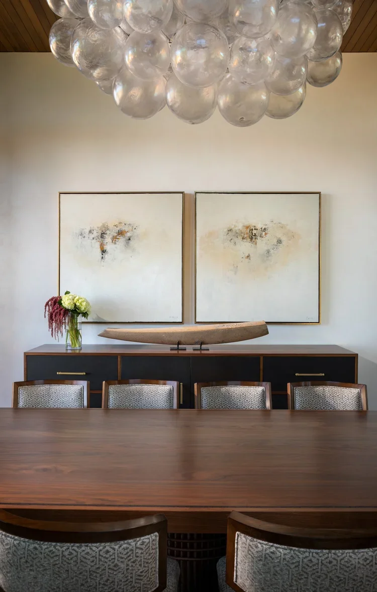 Elegant Dining Room with Wood Table and Contemporary Chandelier