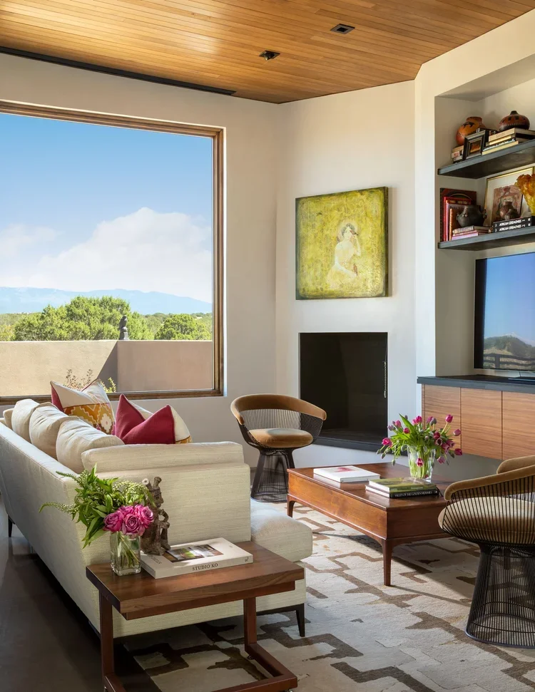 Bright Living Room with Mountain Views and Wood Ceiling
