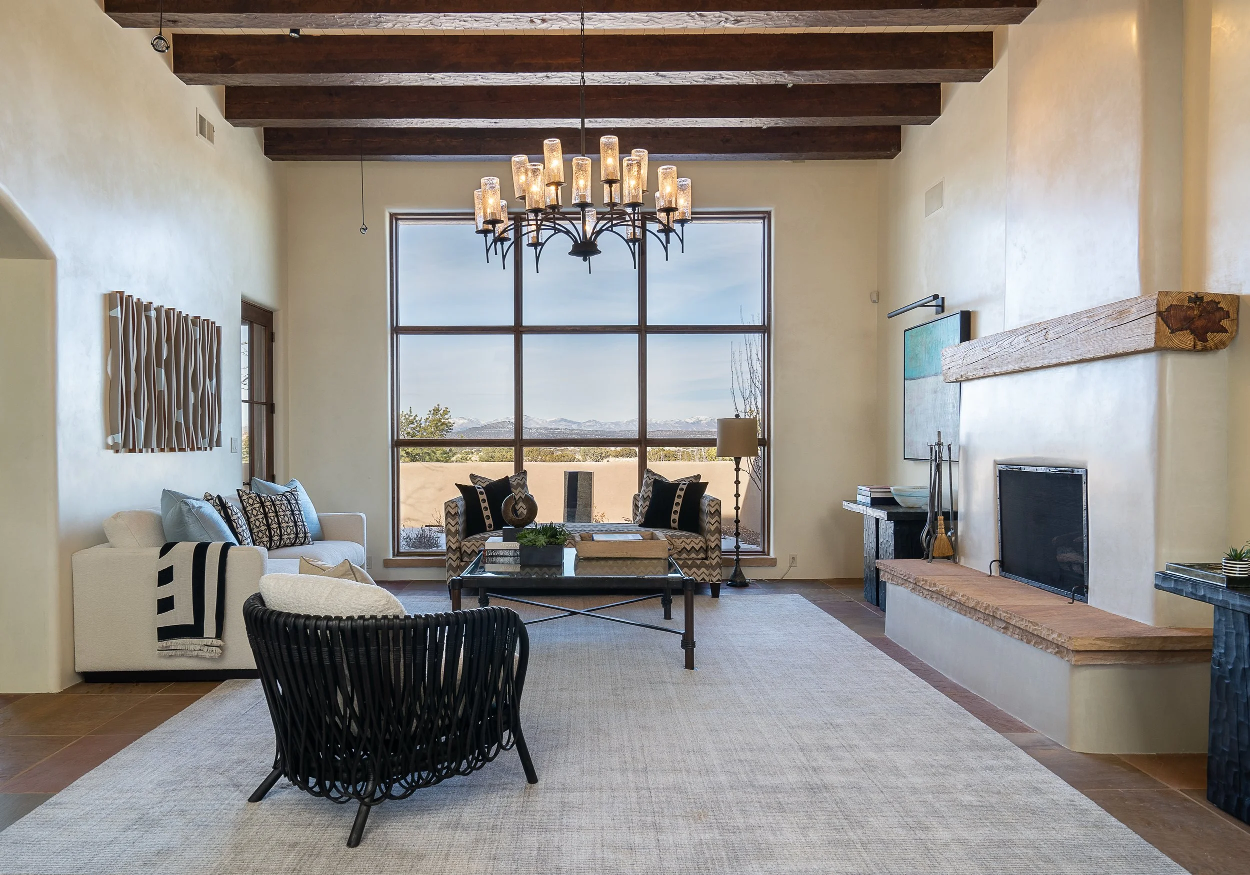 Southwestern Living Room with Fireplace by Chandler Prewitt Design