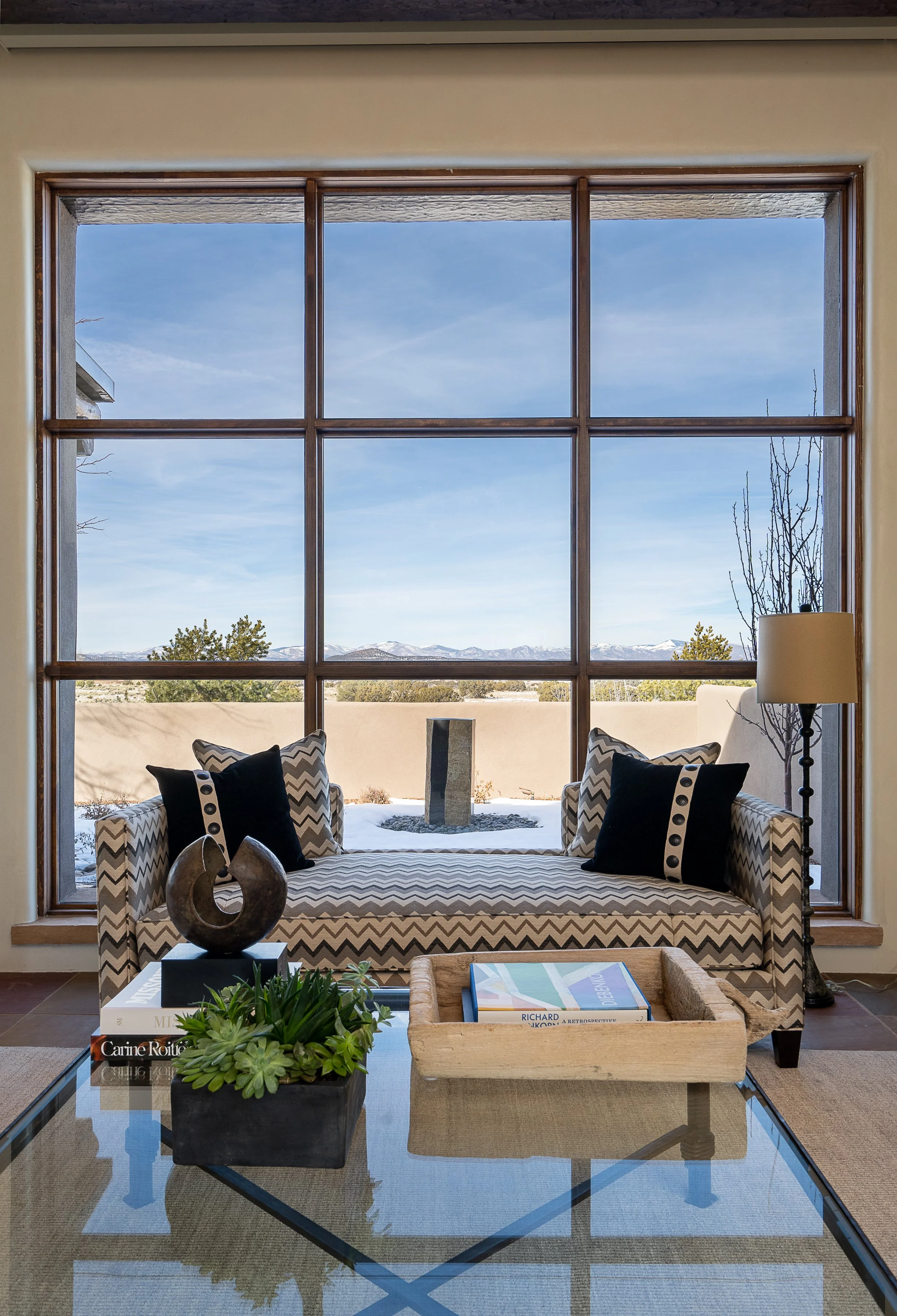 Living Room with Panoramic Mountain Views by Chandler Prewitt Design