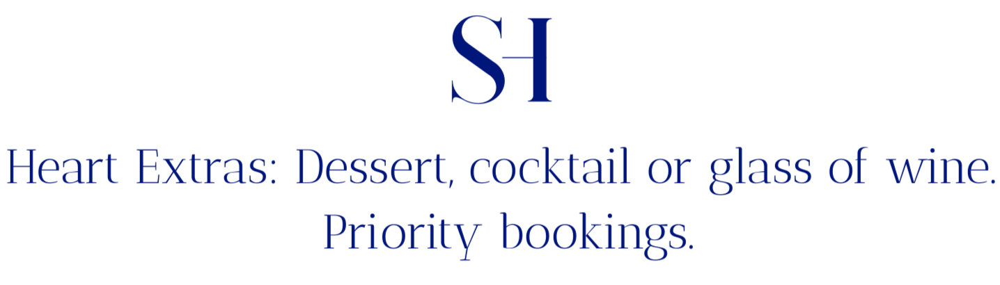 A heart-shaped icon with the letter 'SH' at the top and text below reading 'Heart Extras: Dessert, cocktail or glass of wine. Priority bookings.'