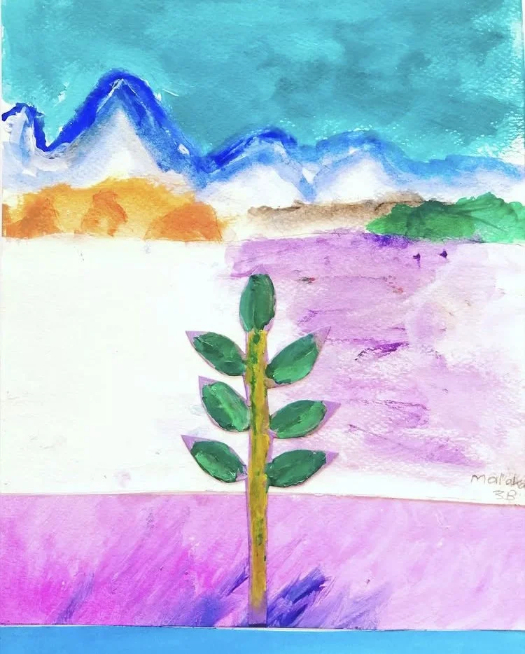 A colorful drawing of a landscape with mountains in the background, a green bush on the right, and a large green plant with multiple leaves in the center. The sky is teal, and the ground features pink and purple hues.