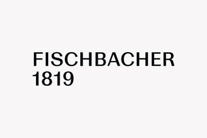 Text mit den Worten "Fischbacher 1819" auf weißem Hintergrund.