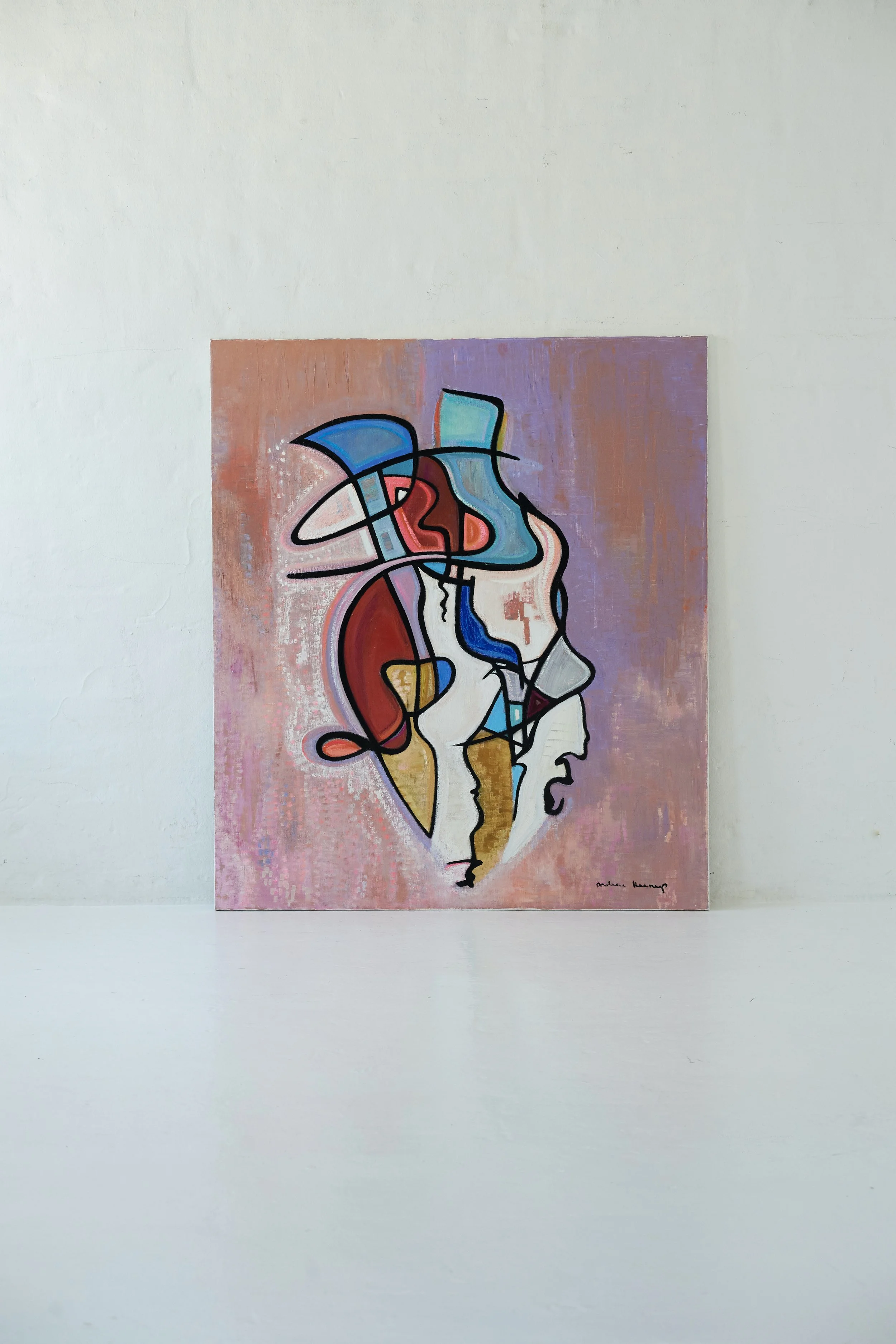 Colorful abstract painting of human faces in profile on a pink and purple background.