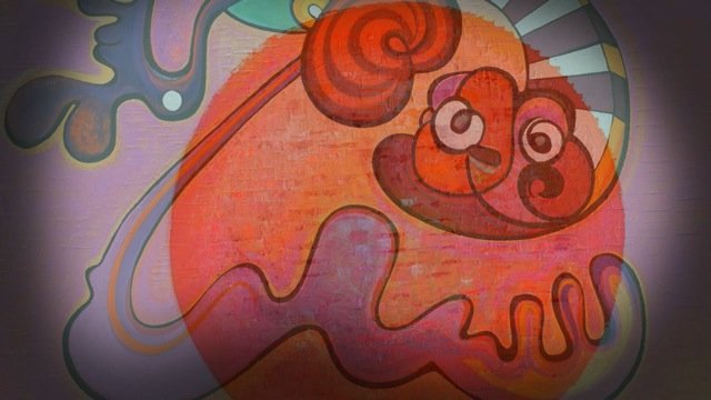 Digital illustration of a colorful chameleon with exaggerated eyes and swirling patterns.