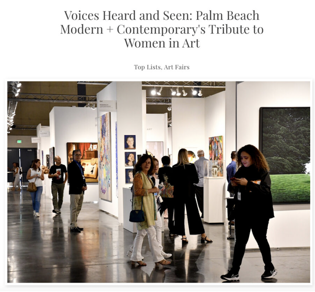 People viewing artwork at an art fair in a gallery with white walls and diverse paintings on display.