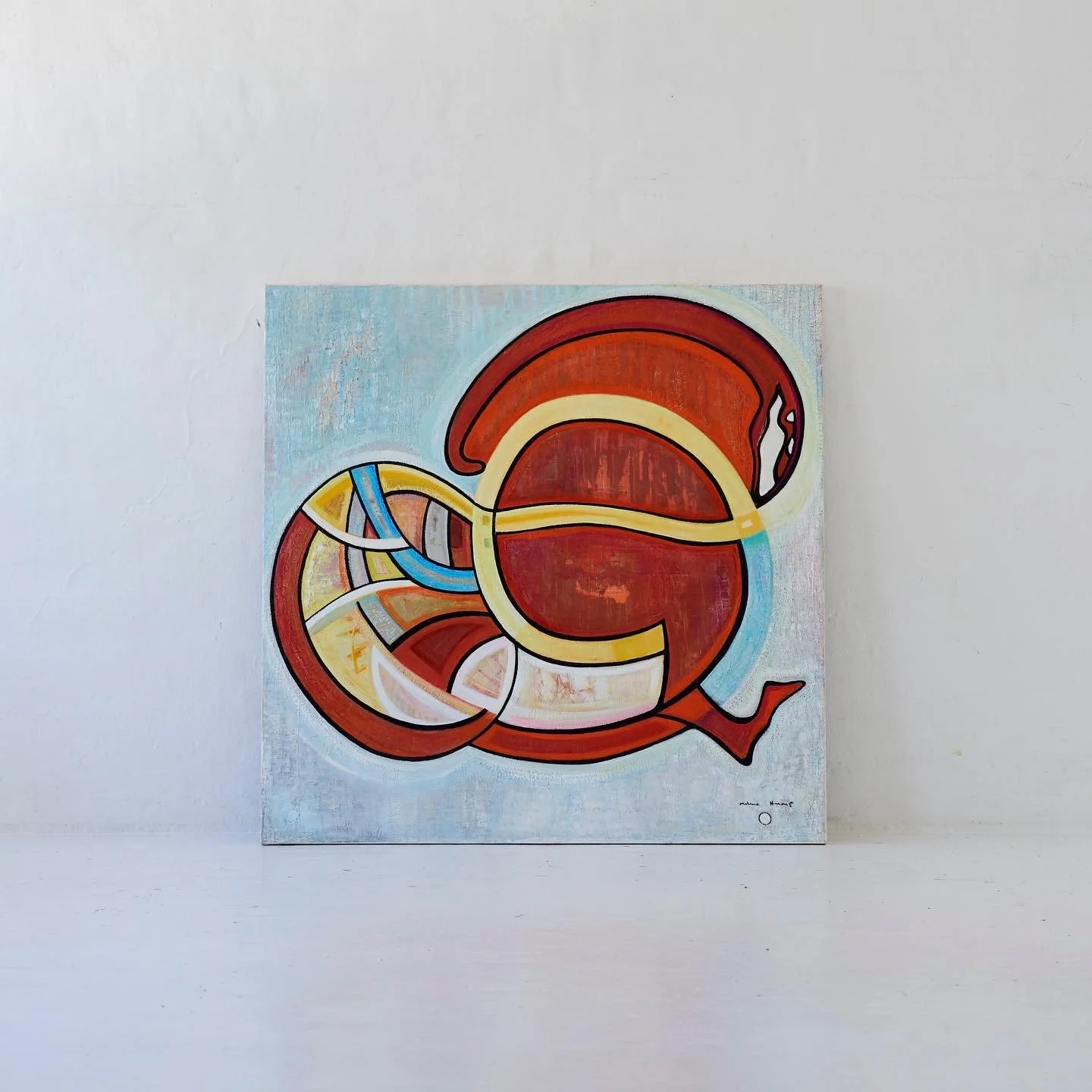 Abstract painting of a stylized anatomical diagram, featuring a large red and yellow circular shape, with various connected sections in red, yellow, and blue, on a light blue background.