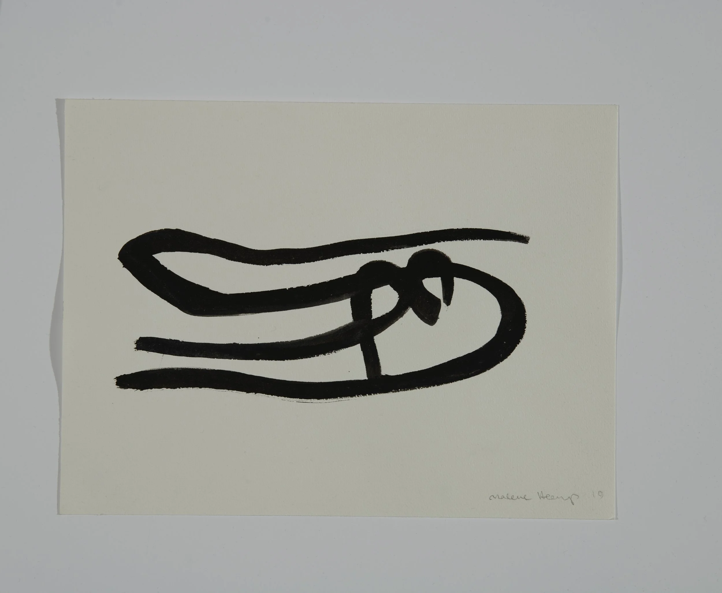 Black abstract line drawing on white paper resembling a reclining figure or a flowing ribbon, signed by the artist in the bottom right corner.
