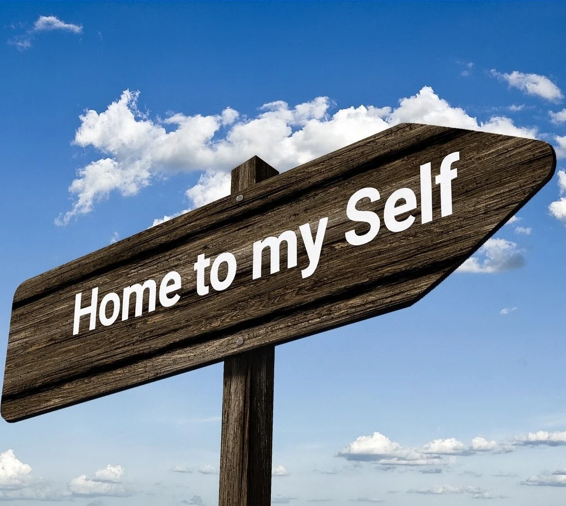 home signpost with letters cropped.jpg