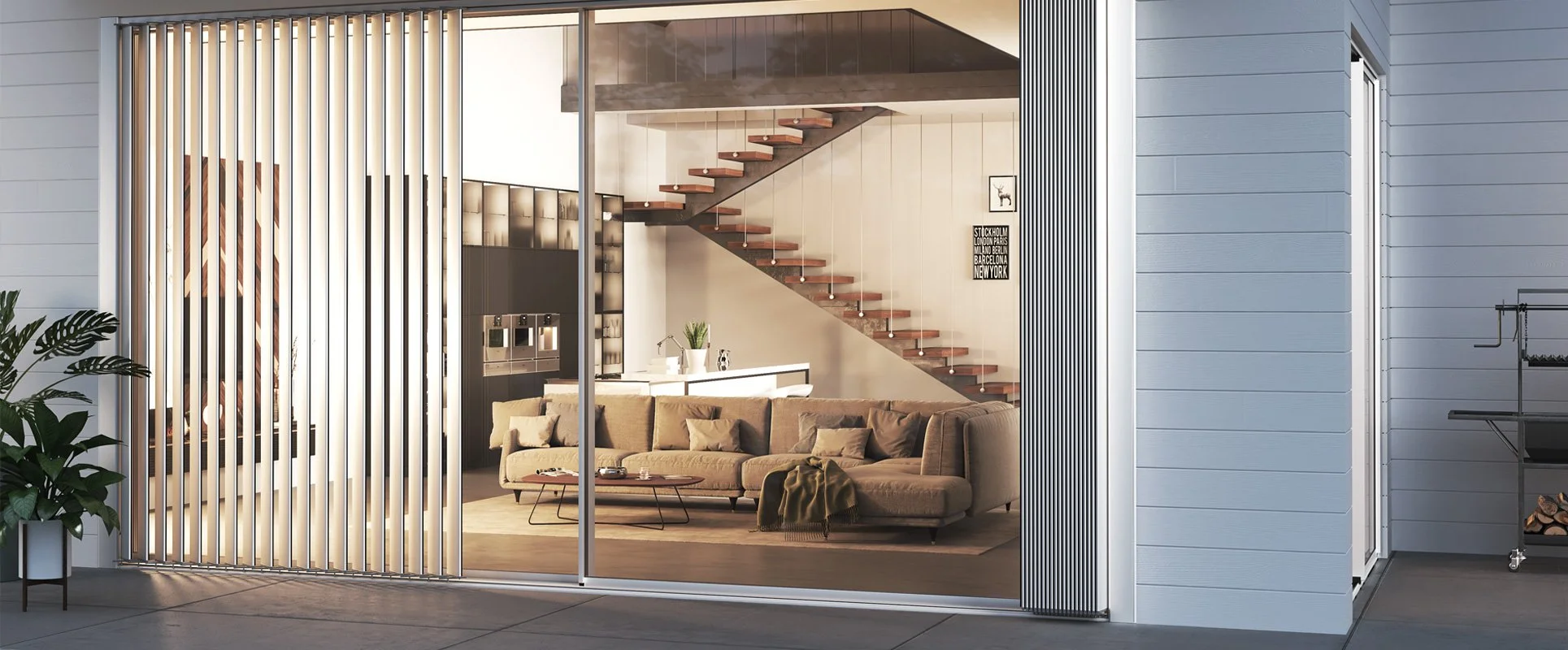 Modern house interior with open living space, beige sectional sofa, glass coffee table, and staircase with wooden steps and black railing, viewed through glass sliding doors.