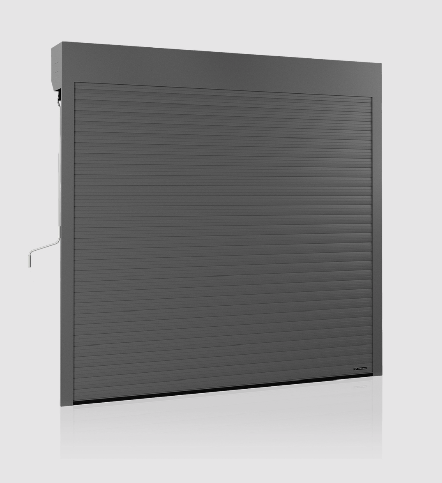 A gray industrial roll-up security shutter door with a handle on the left side.