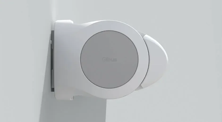 A white cable management box mounted on a white wall.