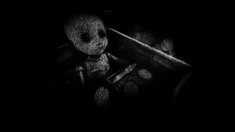 A person holding a doll with a skeleton-like puppet surrounded by toys, in a dark setting.