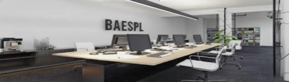Modern conference room with a long table, chairs, computers, and a wall with large BAESPL letters