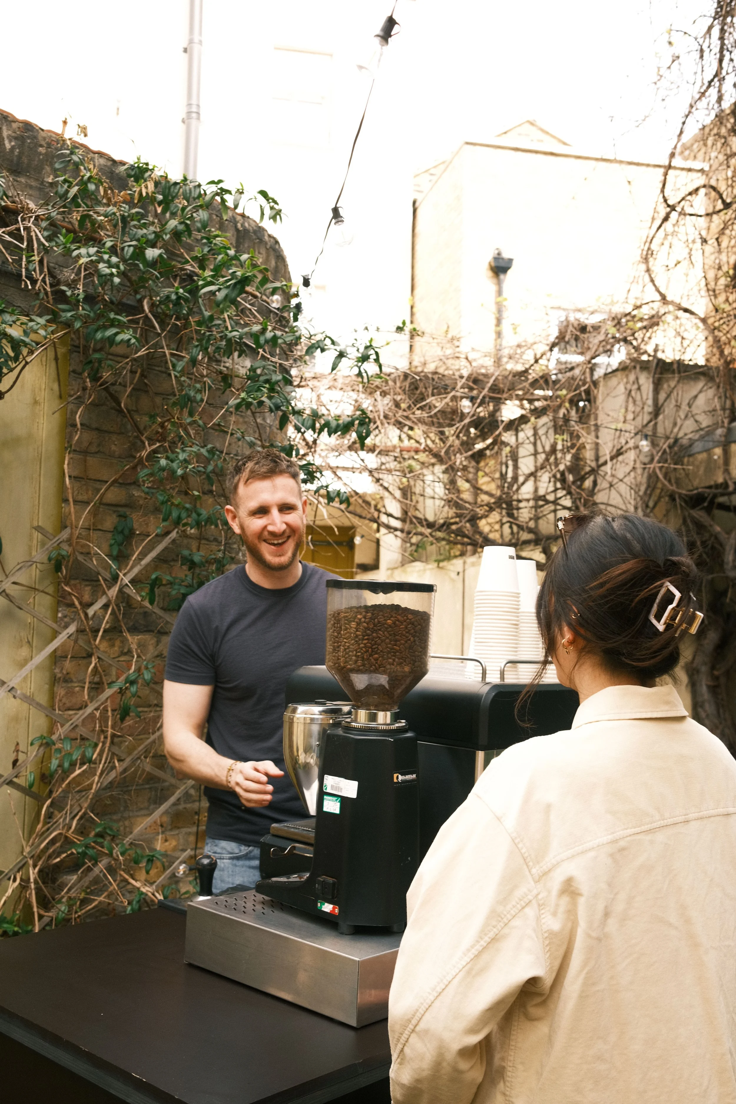 Mobile Coffee Cart with a customer at the bar
