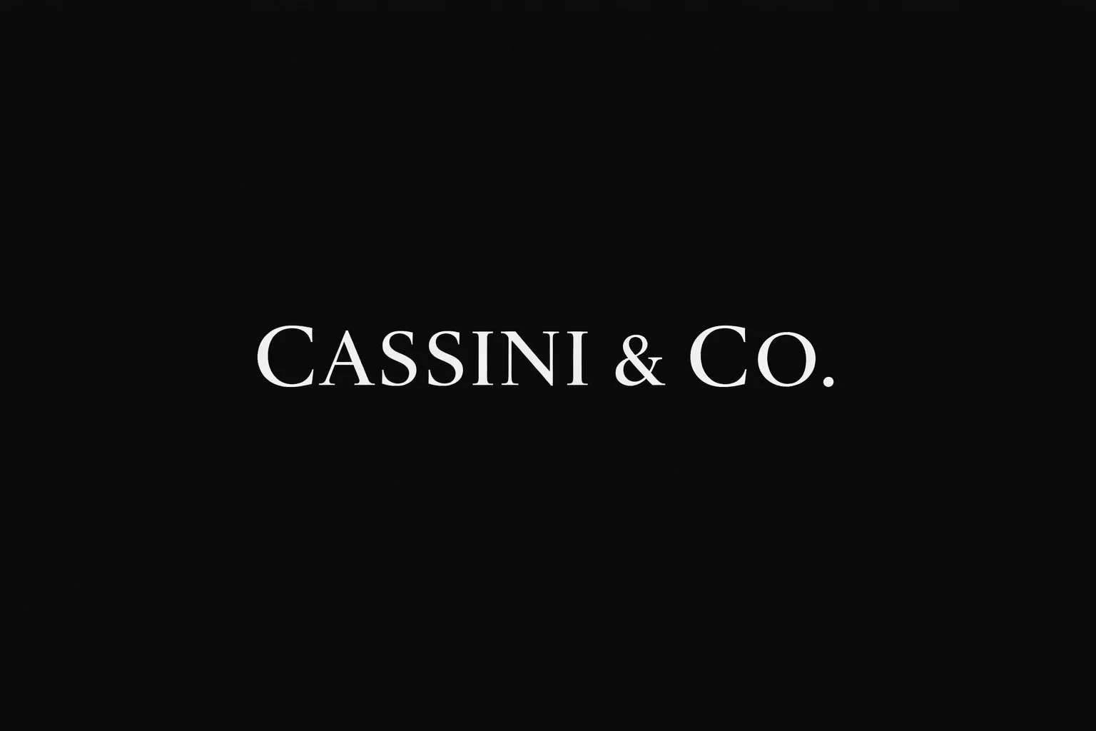 Black background with white text that says "CASSINI & CO."